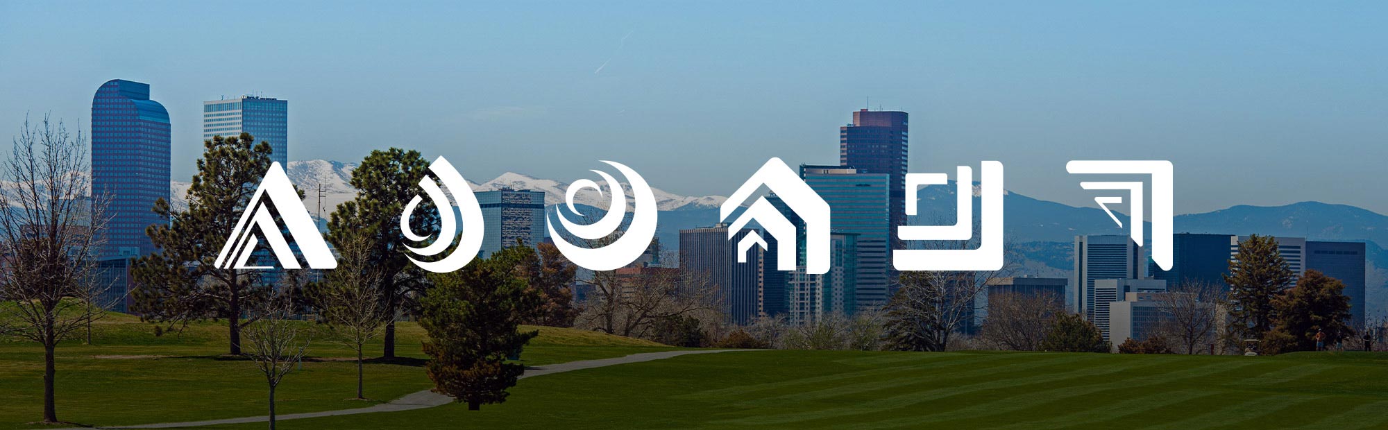 A skyline photo with the logos of each SAGE brand superimposed in white.